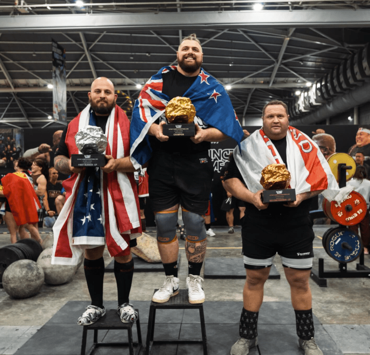 Professional strongman Tyler Helm, coached by Colin Webb, after a major competition win.